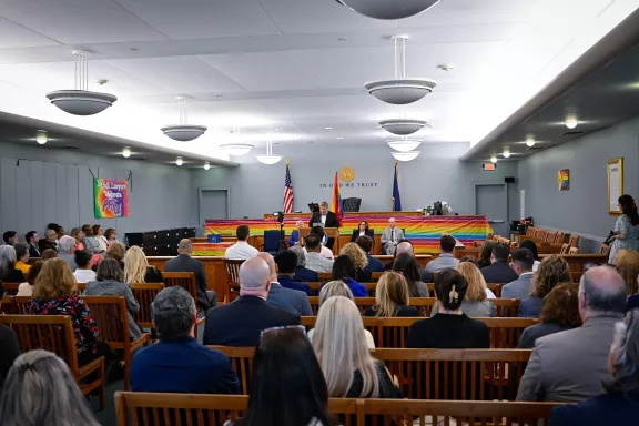 Attendees watch on as keynote speaker and honoree Omar Gonzalez-Pagan, Esq. delivers a moving keynote address. 