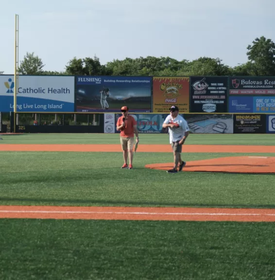 Tenth District Administrative Judge Andrew A. Crecca throws out the ceremonial first pitch during the Court Night at Ducks Stadium at Fairfield Properties Ballpark 