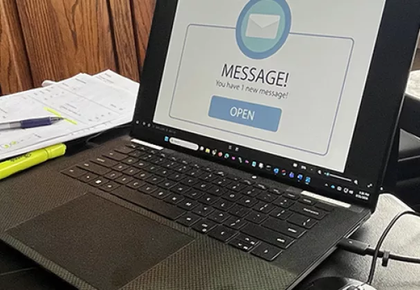 Photo of a laptop with you've got mail message